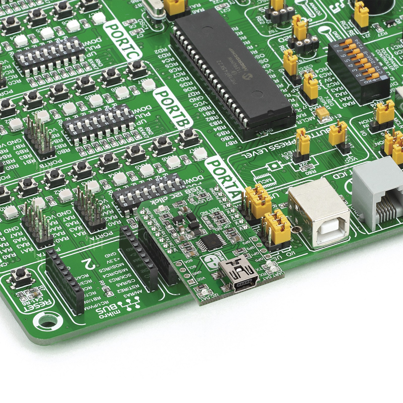 USB I2C click — board with MCP2221 USB-to-UART/I2C converter image.